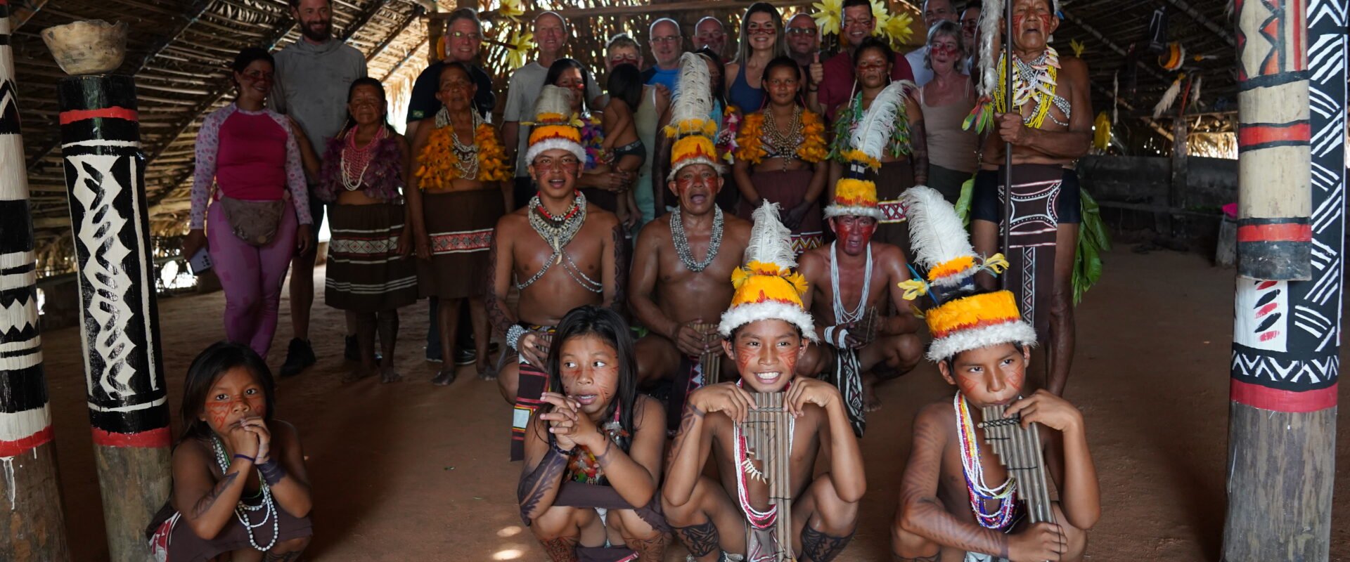 Ricardo with indigenous community on Amazon expedition