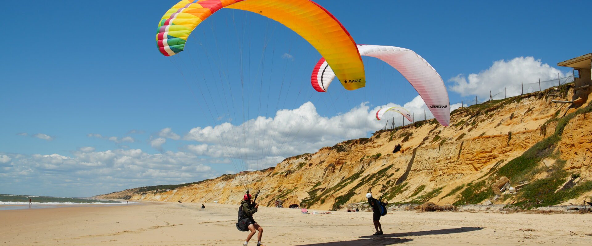 Paramotor takeoff on a Portuguese beach — Ricardo Caju leading